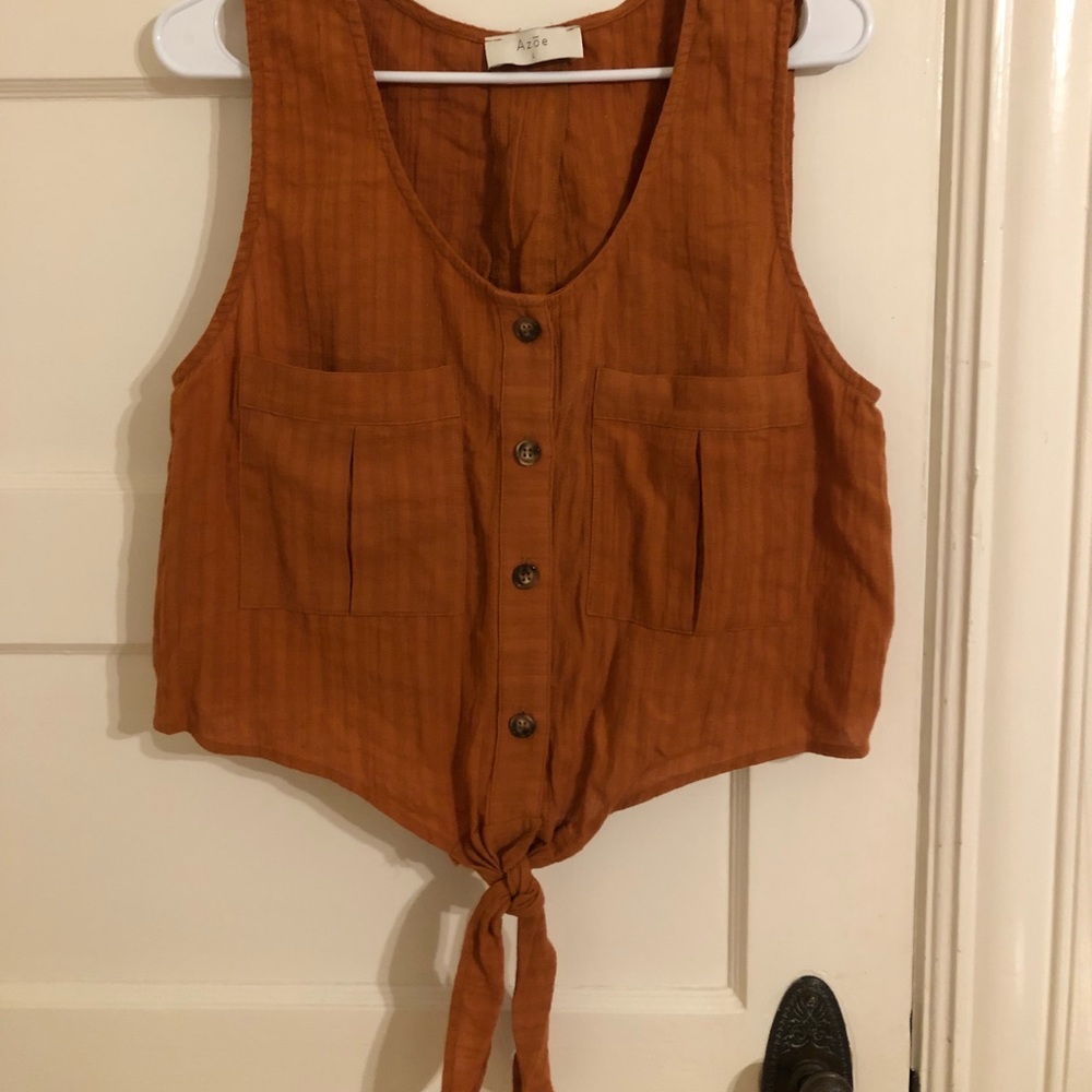 Cute crop top shirt with buttons down the front.